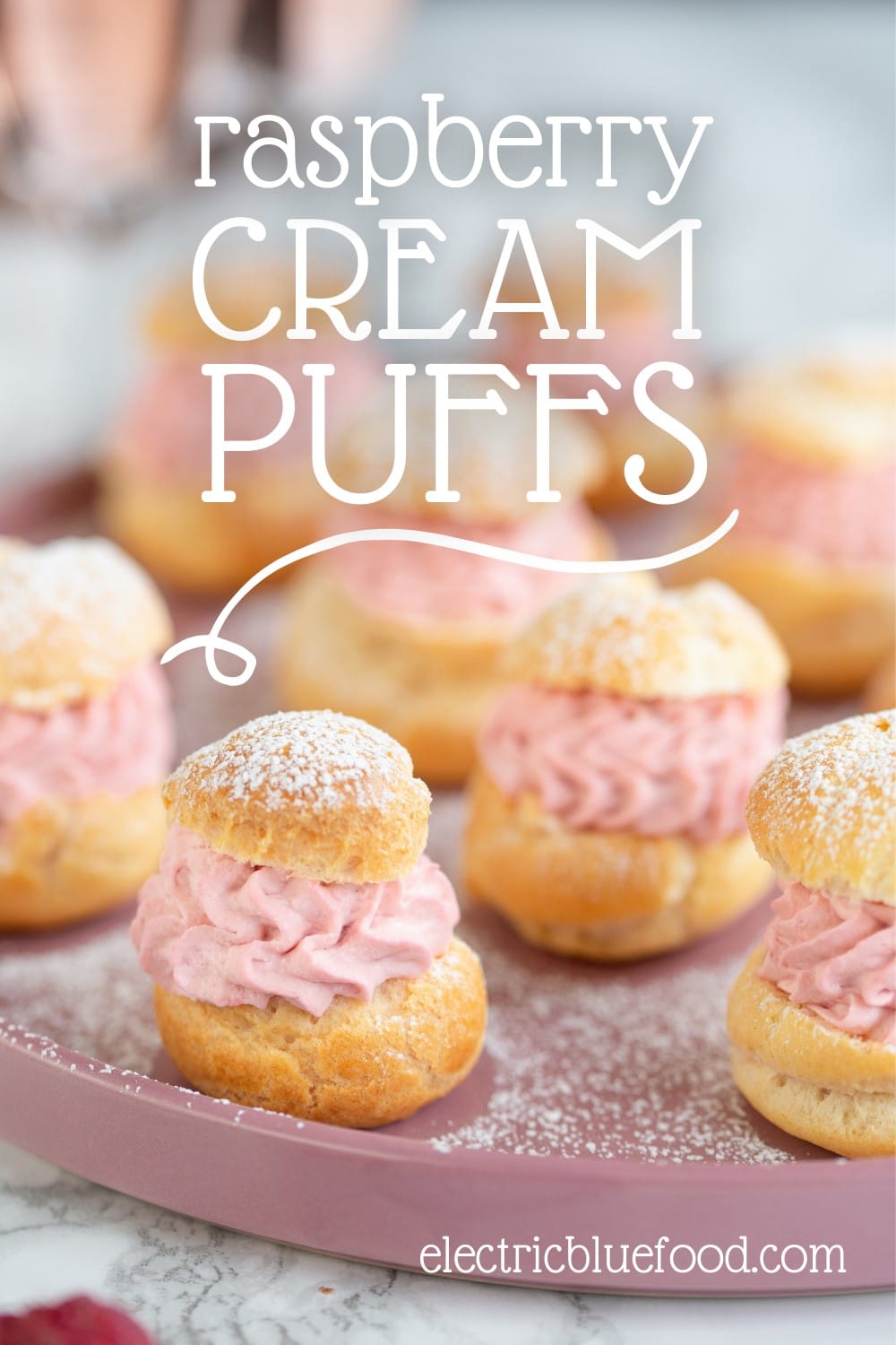 Homemade choux pastry puffs filled with a raspberry cream. These raspberry cream puffs from scratch are an elegant dessert to serve your guests. This small batch yields 10-12 puffs.