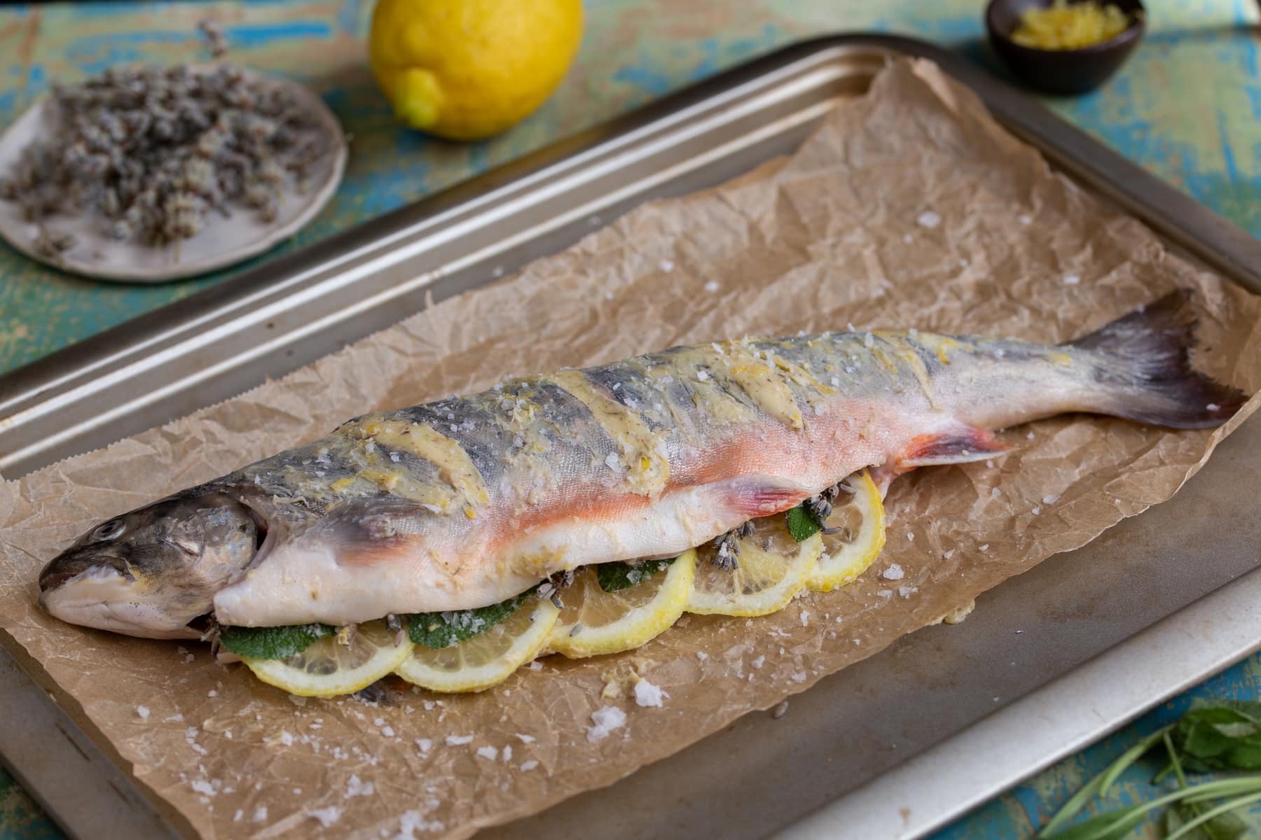 Seasoned trout ready to go into the oven.