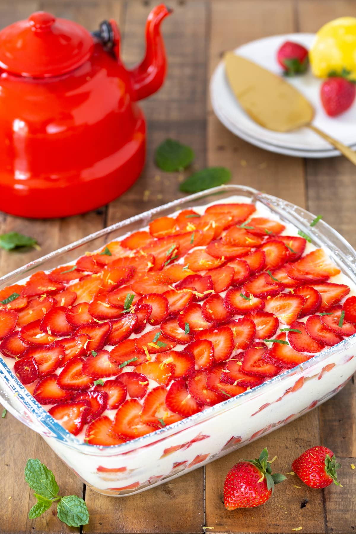 Strawberry limoncello tiramisu in a see-through casserole.