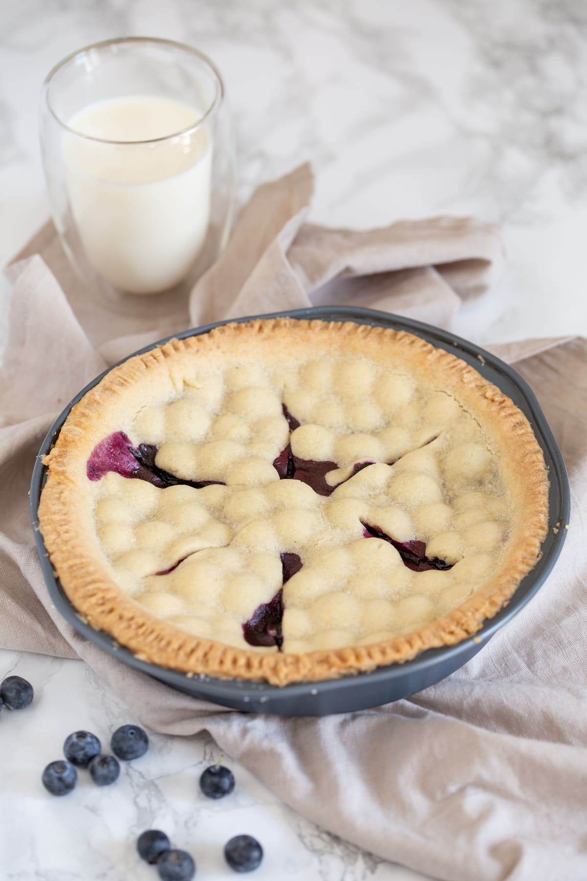 Uncut blueberry pie.