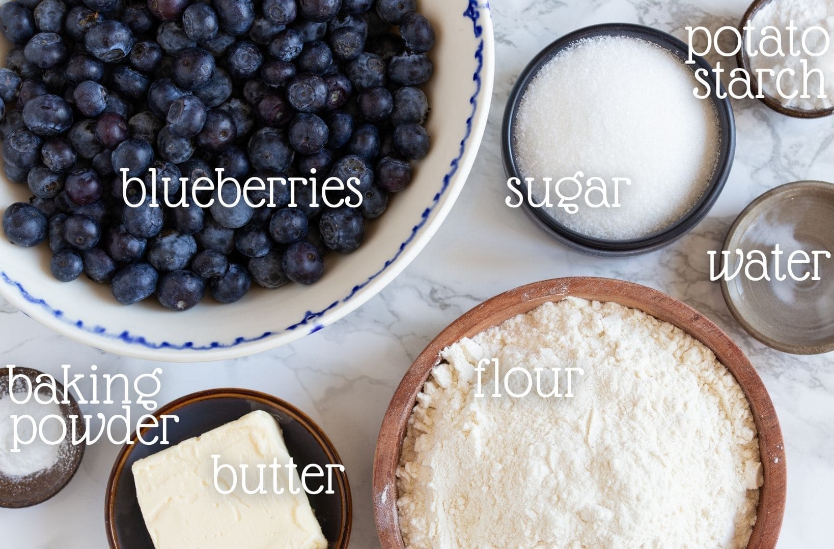 The ingredients needed in this recipe laid out on a marble surface.