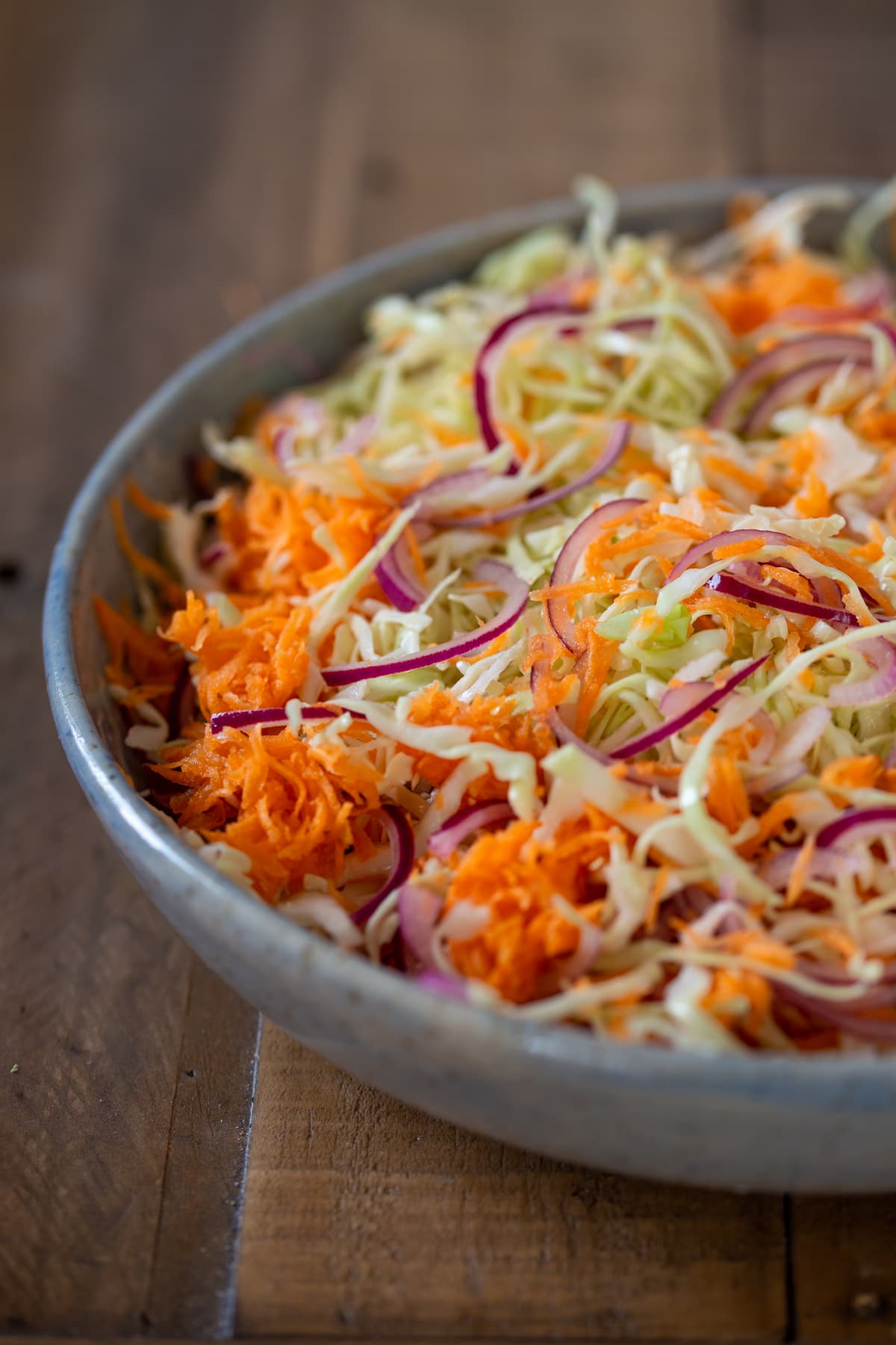 Slaw resting with the condiment.