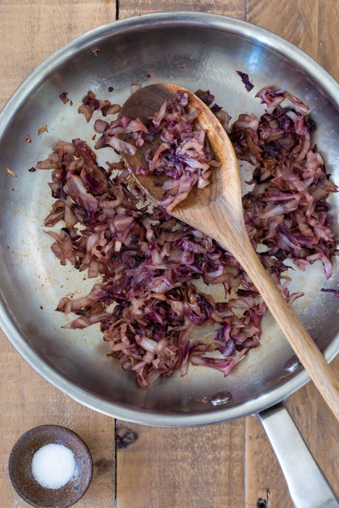 Sauté radicchio in a pan.