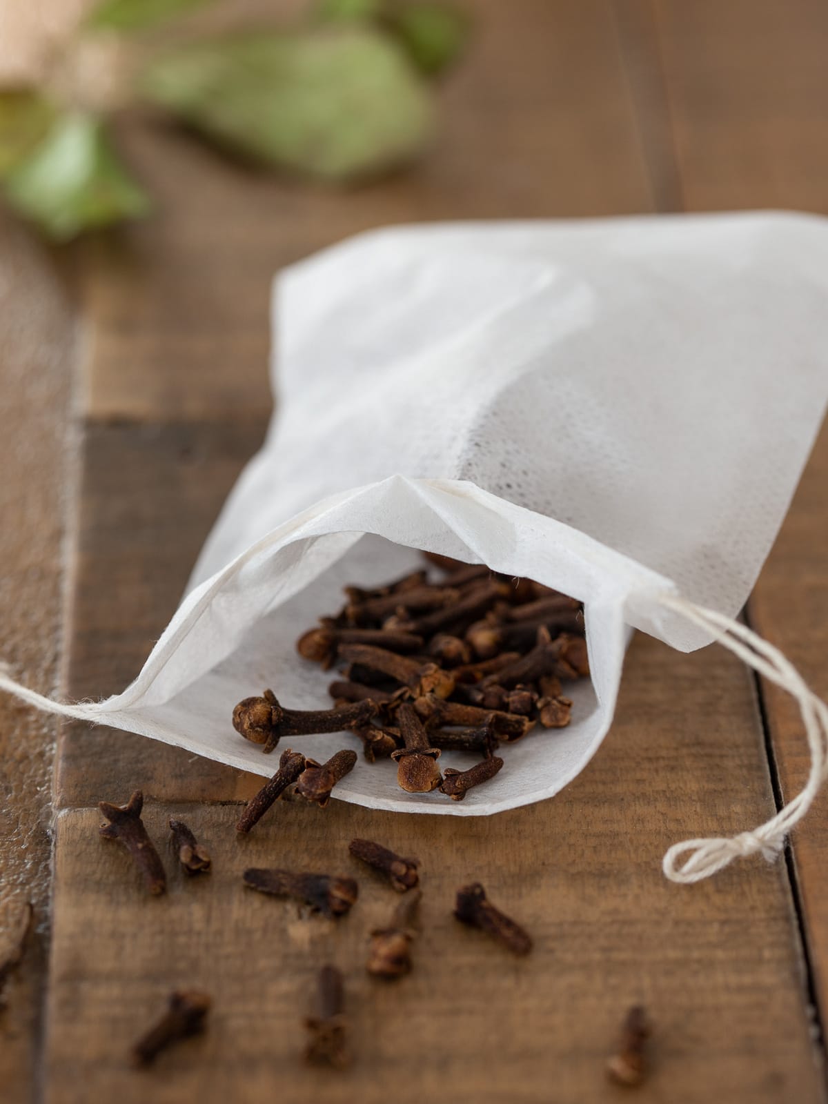 Whole cloves in a teabag.