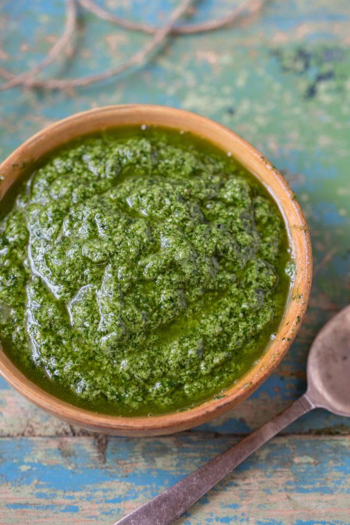 A bowl with pesto.
