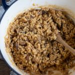 Porcini risotto in a Dutch oven pot.