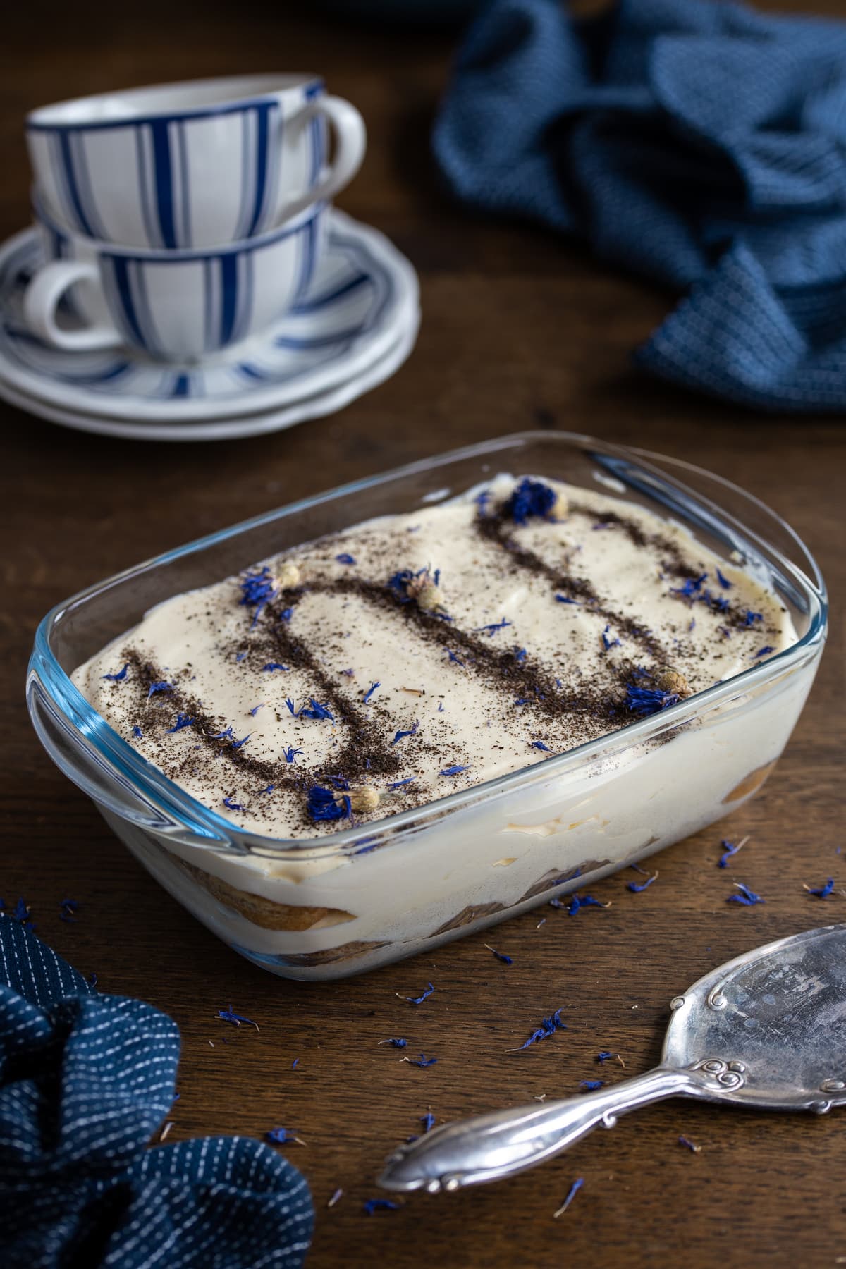 Earl Grey tiramisu topped with powdered tea and cornflower petals.