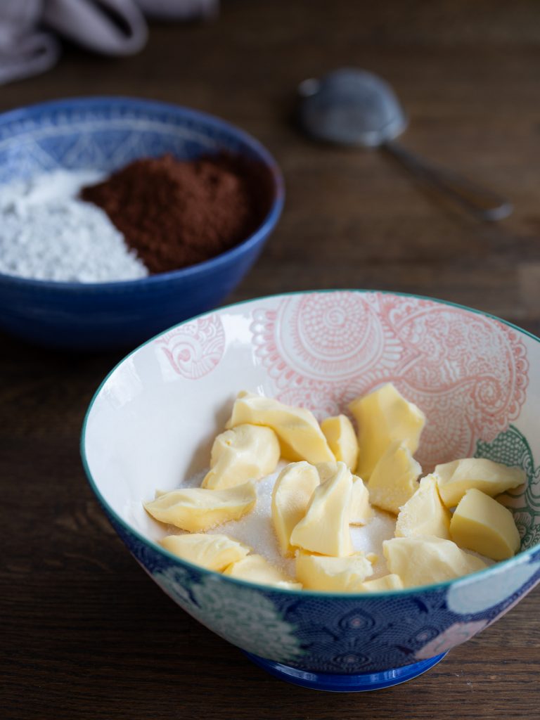 Combine softened butter and sugar in a bowl, and the dry ingredients in another.