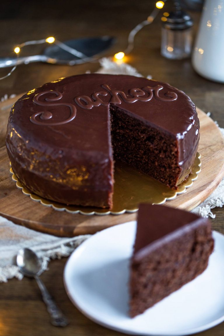 Sacher torte sliced on a plate.