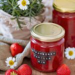 Strawberry and gin jam in a jar and on bread.