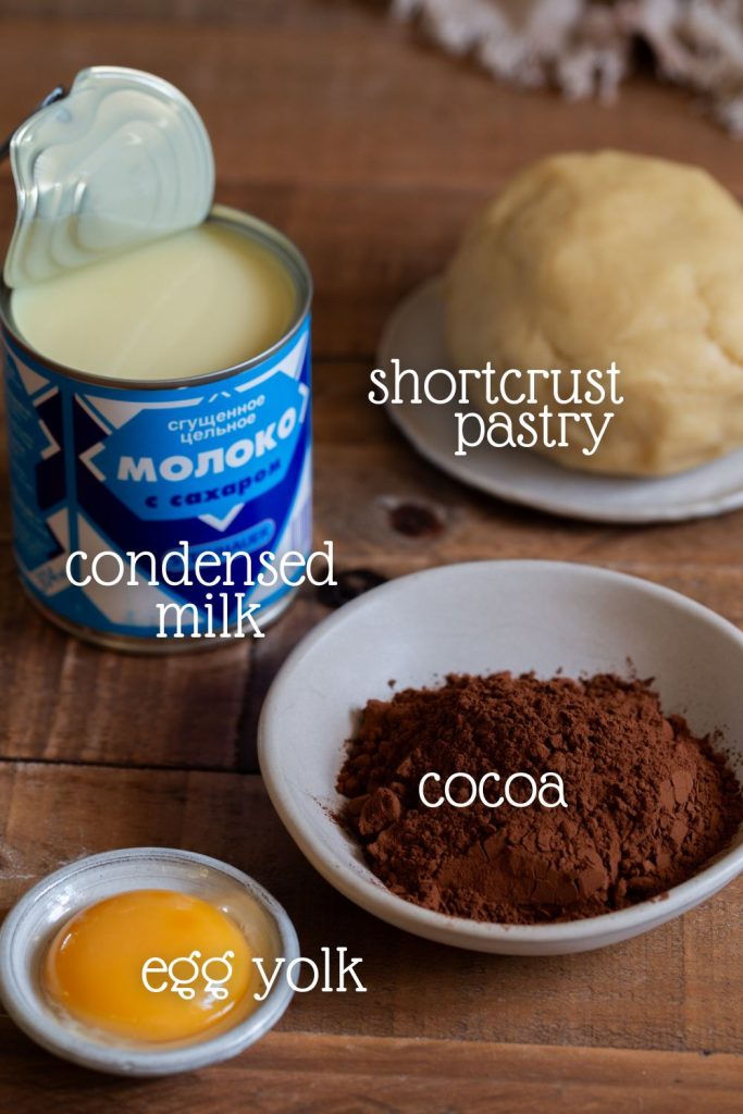 The ingredients to make chocolate tart with condensed milk.