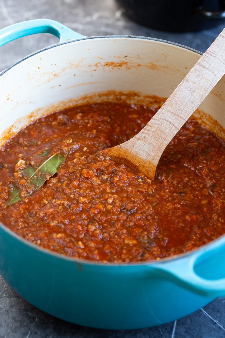 Le Creuset pot filled with vegetable ragu.